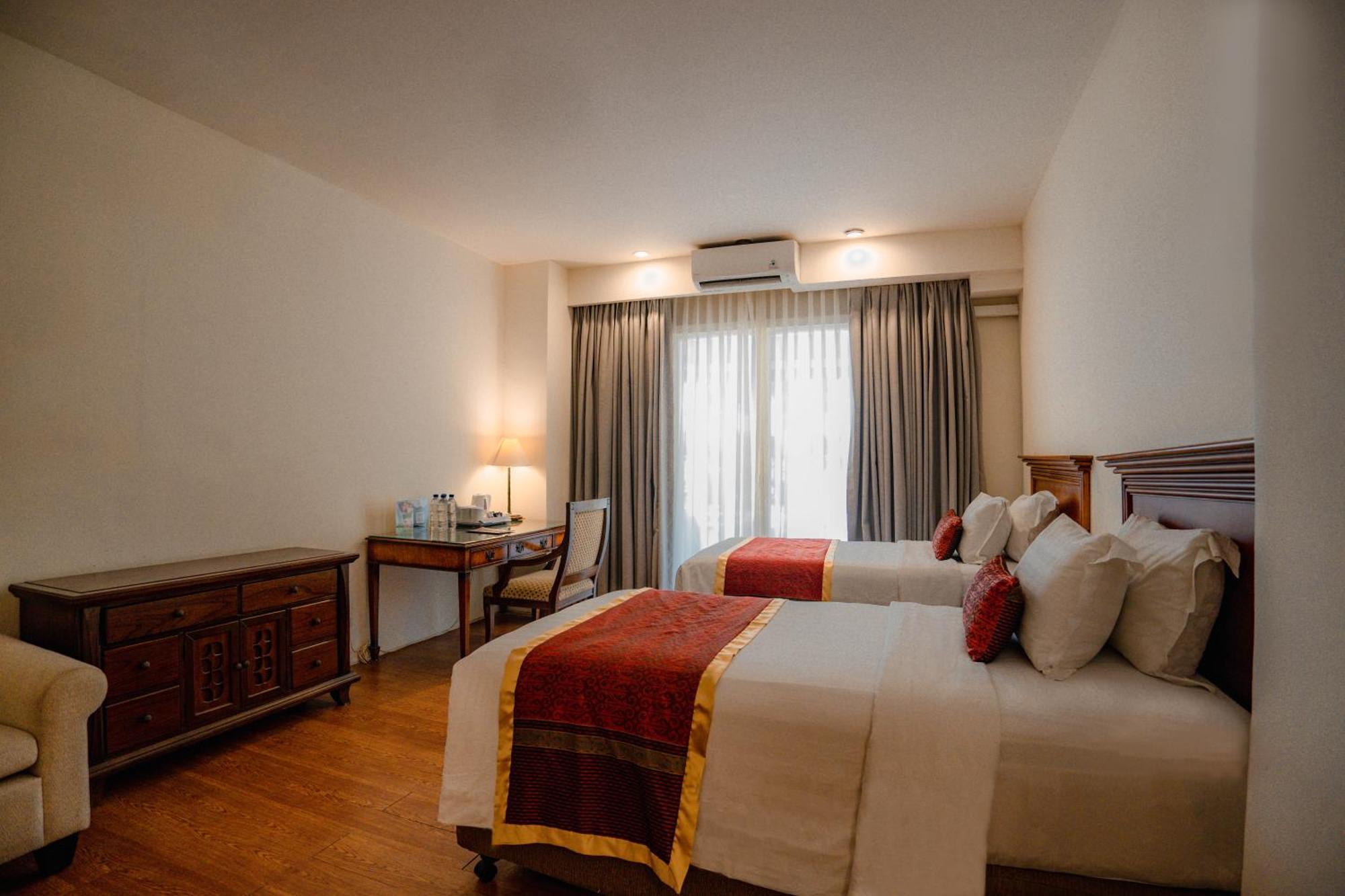 Chambre Familiale avec Transfert Aéroport Gratuit